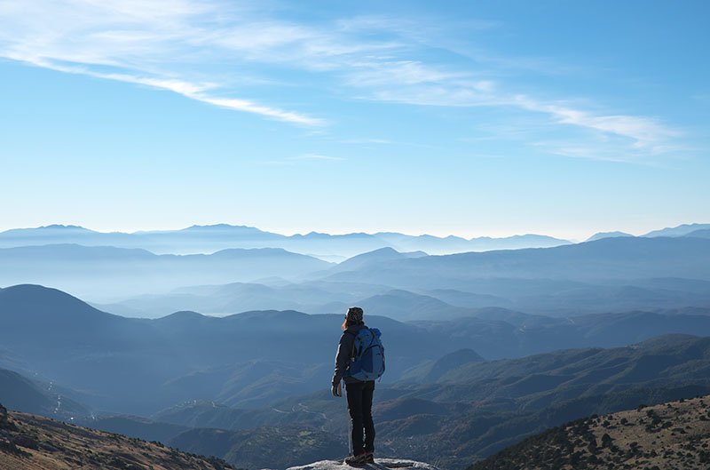 Woman standing on mountain